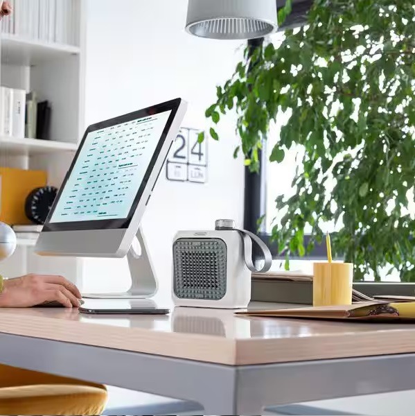 دفاية بمروحة ديلونجي Capsule Desk، بقوة 360 وات، اخضر - HFX10B03.GR - الصورة 5