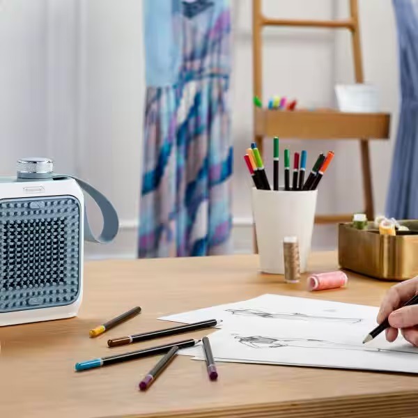 De’Longhi Capsule Desk Ceramic Fan Heater, 360 Watt, Light Blue - HFX10B03.LB - Image 5