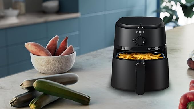 قلايه فيليبس الهوائية السلسلة ١٠٠٠ - ٣.٢ لتر، ١٣٠٠ واط، تقنية الهواء السريع، تناظرية، متصلة بتطبيق هوم آي دي، لون أسود - NA110/00
- ضمان سنتين من رايه - الصورة 5